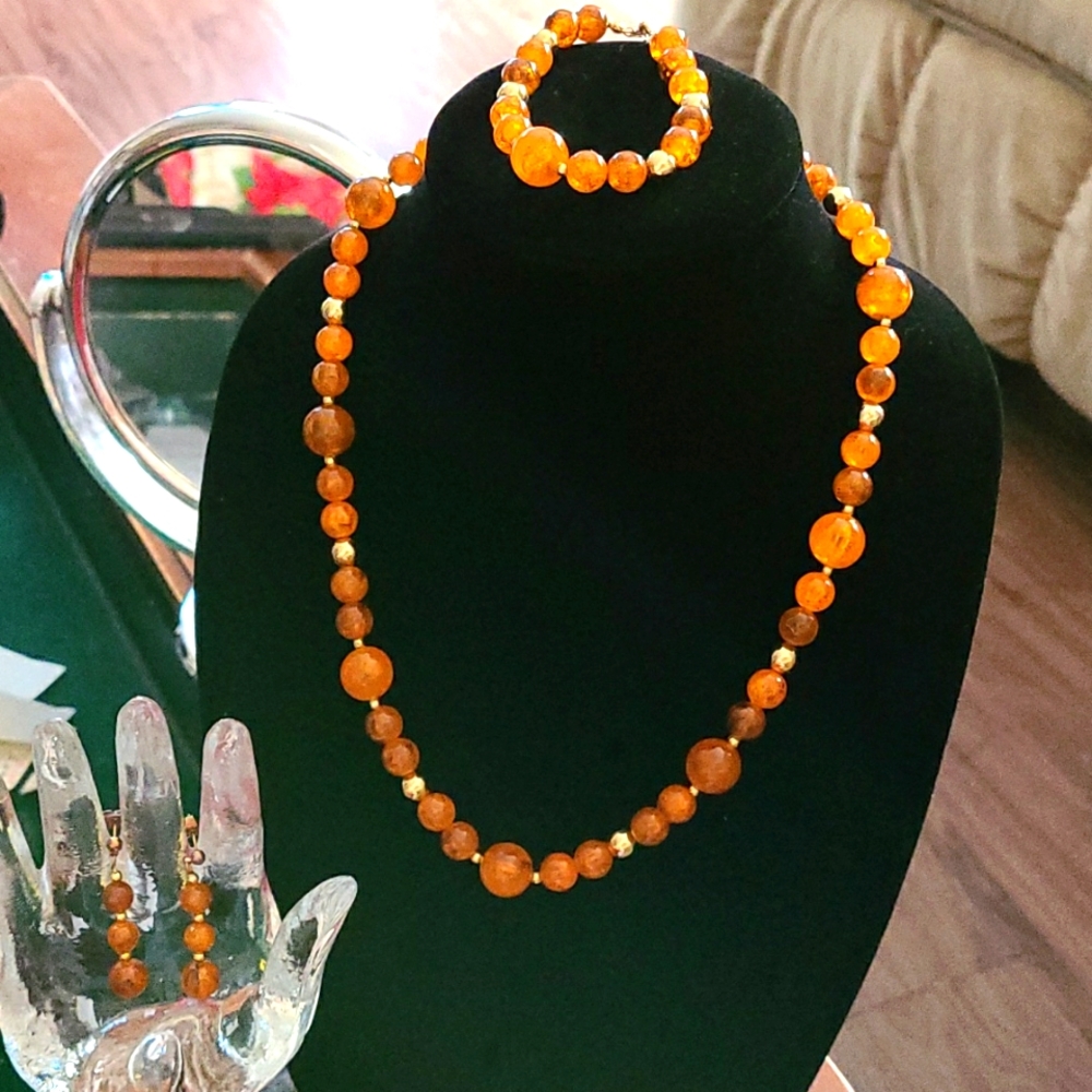 Set of necklace, earrings, bracelet